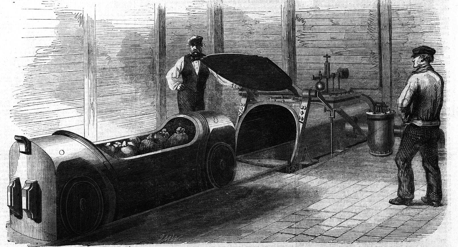 Gravure de l’entrée d’un tube de la London Pneumatic Despatch Company et de sa voiture